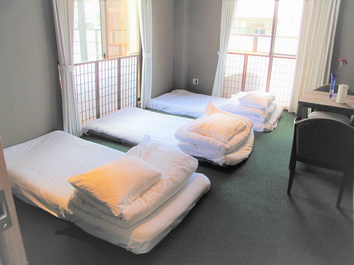 ホステル二木 Hostel Futagi ゲストハウス Фукуока Номер фото